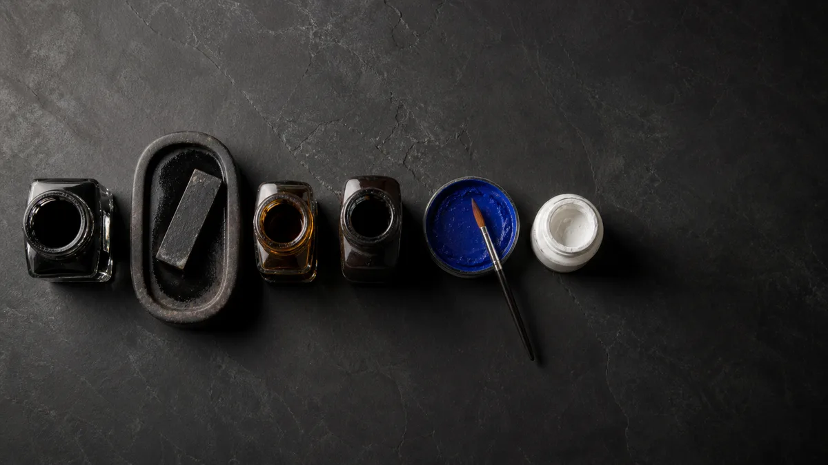 Assortment of calligraphy inks: india, sumi, iron gall, walnut, gouache, and acrylic.